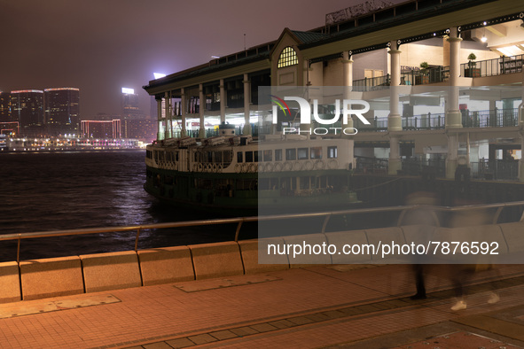 A Star Ferry is moored at Central Piers. The emblematic cross-harbour ferry line had to reduce its service frequency because of the pandemic...