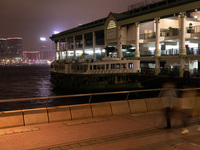 A Star Ferry is moored at Central Piers. The emblematic cross-harbour ferry line had to reduce its service frequency because of the pandemic...