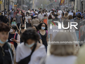 Passers-by in the Zócalo of Mexico City during the change to green epidemiological traffic light after recording a decrease in hospital occu...