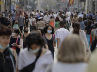 Passers-by in the Zócalo of Mexico City during the change to green epidemiological traffic light after recording a decrease in hospital occu...