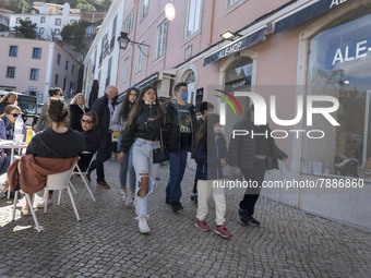 People wearing protective masks are seen walking around the historic center of Sintra. 28 February 2022. According to the General Health Dir...