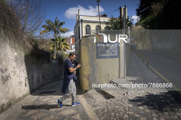 A person is seen walking around the historic centre of Sintra. 28 February 2022. According to the General Health Direction (DSG) bulletin, s...