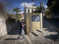 A person is seen walking around the historic centre of Sintra. 28 February 2022. According to the General Health Direction (DSG) bulletin, s...