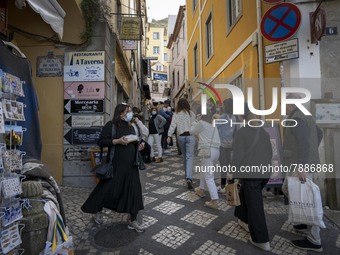 People wearing protective masks are seen walking around the historic center of Sintra. 28 February 2022. According to the General Health Dir...