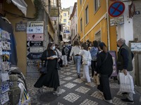 People wearing protective masks are seen walking around the historic center of Sintra. 28 February 2022. According to the General Health Dir...