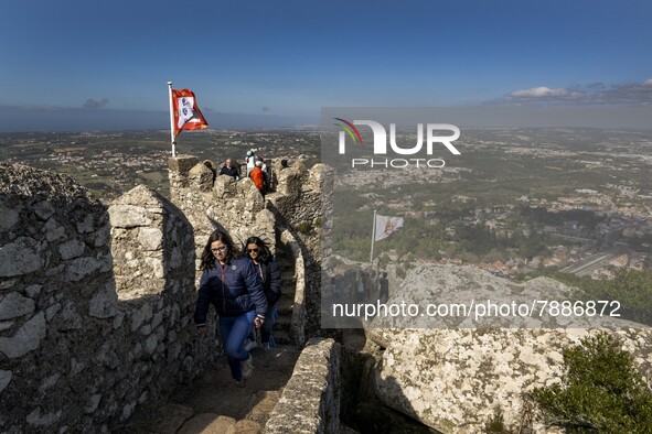 People walk around the Moorish Castle located in the historic centre of Sintra. 28 February 2022. According to the General Health Direction...