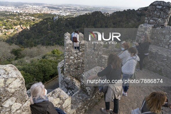 People walk around the Moorish Castle located in the historic centre of Sintra. 28 February 2022. According to the General Health Direction...