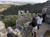 People walk around the Moorish Castle located in the historic centre of Sintra. 28 February 2022. According to the General Health Direction...