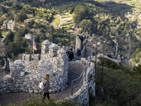 People walk around the Moorish Castle located in the historic centre of Sintra. 28 February 2022. According to the General Health Direction...