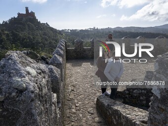 People walk around the Moorish Castle located in the historic centre of Sintra. 28 February 2022. According to the General Health Direction...