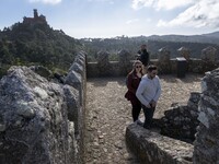 People walk around the Moorish Castle located in the historic centre of Sintra. 28 February 2022. According to the General Health Direction...