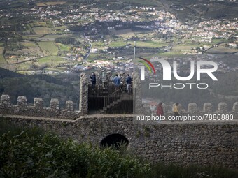 People walk around the Moorish Castle located in the historic centre of Sintra. 28 February 2022. According to the General Health Direction...