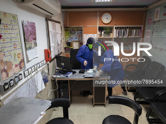 Two Iranian nurses wearing protective suits work at a COVID-19 ward in a children hospital in the holy city of Qom 145Km (90 miles) south of...