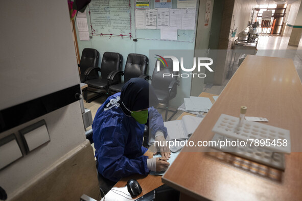 An Iranian nurse wearing a protective suit works at a COVID-19 ward in a children hospital in the holy city of Qom 145Km (90 miles) south of...