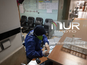 An Iranian nurse wearing a protective suit works at a COVID-19 ward in a children hospital in the holy city of Qom 145Km (90 miles) south of...