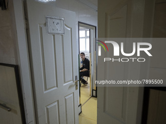 An Iranian man who is infected by COVID-19 looks on as he sits at a room in a COVID-19 ward in a hospital in the holy city of Qom 145Km (90...