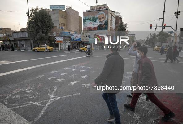 A giant portrait of former commander of Islamic Revolutionary Guard Corps (IRGC) Quds Force, General Qasem Soleimani, is seen on a wall of a...