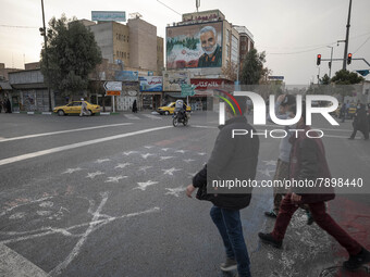 A giant portrait of former commander of Islamic Revolutionary Guard Corps (IRGC) Quds Force, General Qasem Soleimani, is seen on a wall of a...