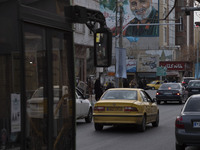 A giant portrait of former commander of Islamic Revolutionary Guard Corps (IRGC) Quds Force, General Qasem Soleimani, is seen on a wall of a...