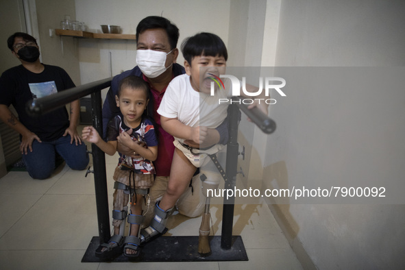 COKI TOBING at its workshop location in Bekasi, West Java. COKI TOBING, the owner of a prosthetic limb and assistive device for people with...