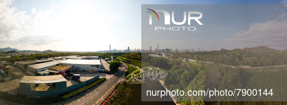  A drone panorama of a bridge in San Tin with Shenzhen's border post and the city of Shenzhen in the background, in Hong Kong, China, on Mar...