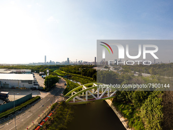  A drone panorama of a bridge in San Tin with Shenzhen's border post and the city of Shenzhen in the background, in Hong Kong, China, on Mar...