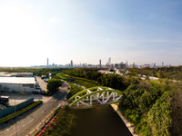  A drone panorama of a bridge in San Tin with Shenzhen's border post and the city of Shenzhen in the background, in Hong Kong, China, on Mar...