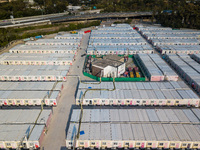  A view by drone of the Santin Community Isolation Facility. In the center, a power distribution centre with generators, in Hong Kong, China...