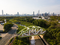  A drone view of a small bridge above a waterway in the town of San Tin, in Northern Hong Kong with the Shenzhen border and the city of Shen...