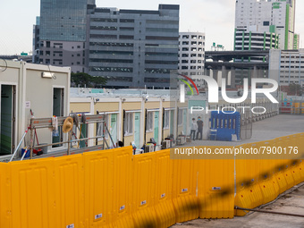  Two COVID patients can be seen at the Tsing Yi Community Isolation Centre, in Hong Kong, China, on Mar 12, 2022. (