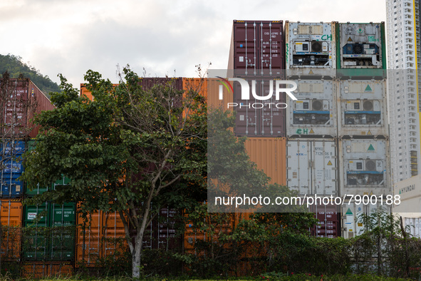  Containers are piled up in a warehouse in Tsing Yi. On the right, refrigerated containers ("reefers") can be seen, in Hong Kong, China, on...