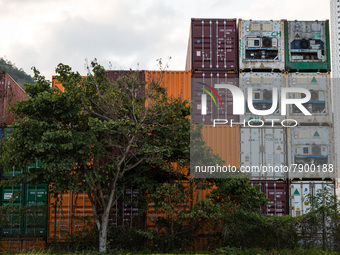  Containers are piled up in a warehouse in Tsing Yi. On the right, refrigerated containers ("reefers") can be seen, in Hong Kong, China, on...