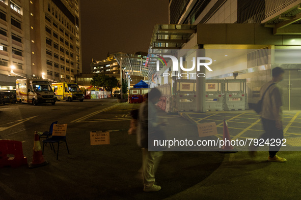 A makeshift triage area in Princess Margaret hospital is delineated via signs on the floor, in Hong Kong, China, on March 16, 2022, in Hong...