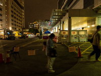 A makeshift triage area in Princess Margaret hospital is delineated via signs on the floor, in Hong Kong, China, on March 16, 2022, in Hong...