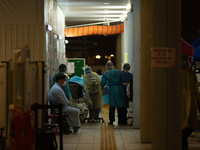 The makeshift outdoor triage area of Princess Margaret Hospital, in Hong Kong, China, on March 16, 2022, in Hong Kong, China, on March 16, 2...