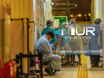 Nurses assist patients in an outdoor triage area at the Accident & Emergency ward of Princess Margaret hospital , in Hong Kong, China, on Ma...