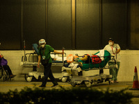 A non-COVID patient is transferred indoors at Princess Margaret hospital, in Hong Kong, China, on March 16, 2022, in Hong Kong, China, on Ma...