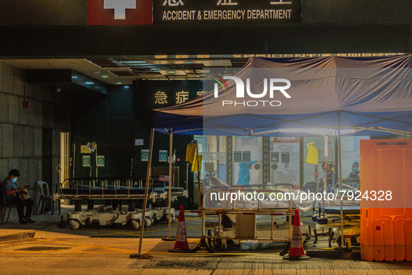 Patients wait for treatment at the Accident & Emergency ward of Caritas Medical Centre, in Hong Kong, China, on March 16, 2022, in Hong Kong...