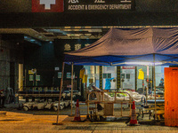 Patients wait for treatment at the Accident & Emergency ward of Caritas Medical Centre, in Hong Kong, China, on March 16, 2022, in Hong Kong...