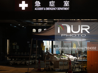 Patients wait for treatment at the Accident & Emergency ward of Caritas Medical Centre, in Hong Kong, China, on March 16, 2022, in Hong Kong...