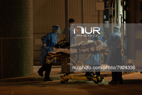 An elderly patient is brought to the Caritas Medical Centre with an automated chest compression device attached, in Hong Kong, China, on Mar...