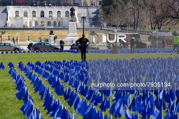 Blue flags are seen on the National Mall in Washington, D.C. on March 18, 2022 as part of the United In Blue art installation. The installat...