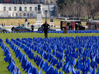 Blue flags are seen on the National Mall in Washington, D.C. on March 18, 2022 as part of the United In Blue art installation. The installat...