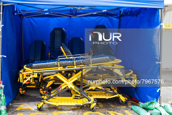 Empty and disinfected stretchers are stored under a tent near the Accident & Emergency ward of United Christian Hospital in Kwun Tong, in Ho...