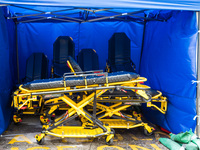 Empty and disinfected stretchers are stored under a tent near the Accident & Emergency ward of United Christian Hospital in Kwun Tong, in Ho...