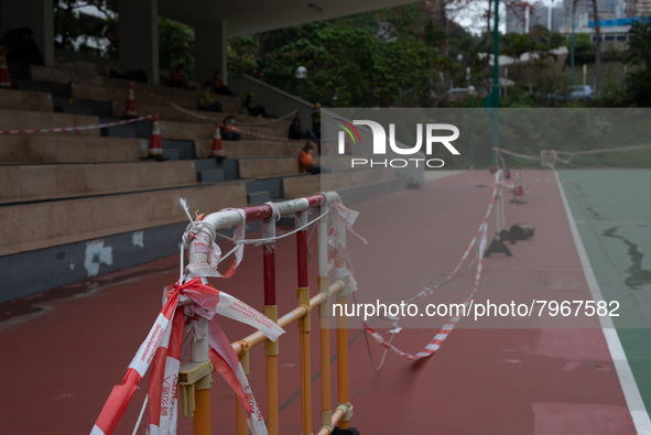 Makeshift barriers cordon off a football pitch in Kwun Tong, in Hong Kong, China, on March 24, 2022.  