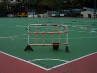 Makeshift barriers cordon off a football pitch in Kwun Tong, in Hong Kong, China, on March 24, 2022.  (