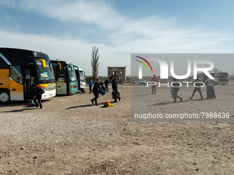 Ukrainian citizens are seen getting the buses at the transit point for refugees in Palanca, south Moldova, on 2022-03-27. (