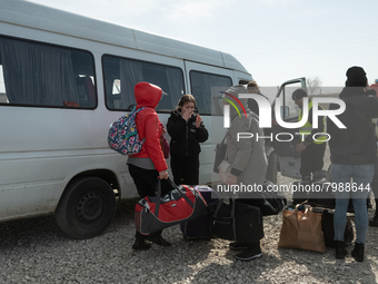 Ukrainian citizens just arrived from the border are seen at the transit point for refugees in Palanca, south Moldova, on 2022-03-27. (