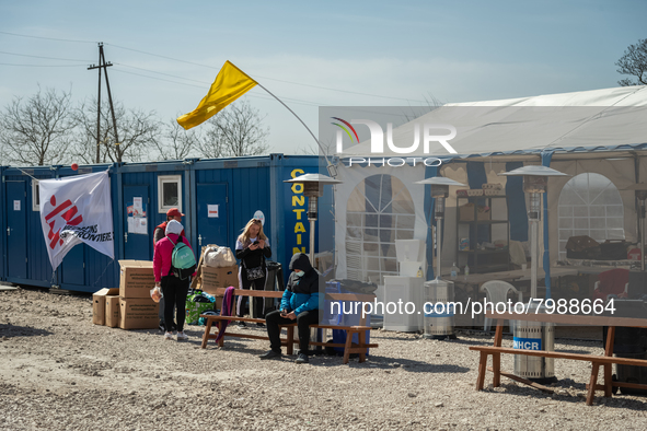 Ukrainian citizens are seen resting at the transit point for refugees in Palanca, south Moldova, on 2022-03-27. 